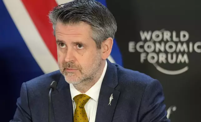 Martin Eyjolfsson, Permanent Secretary of State, Ministry of Foreign Affairs of Iceland, arrives for a signing ceremony at the Annual Meeting of World Economic Forum in Davos, Switzerland, Thursday, Jan. 23, 2025. (AP Photo/Markus Schreiber)