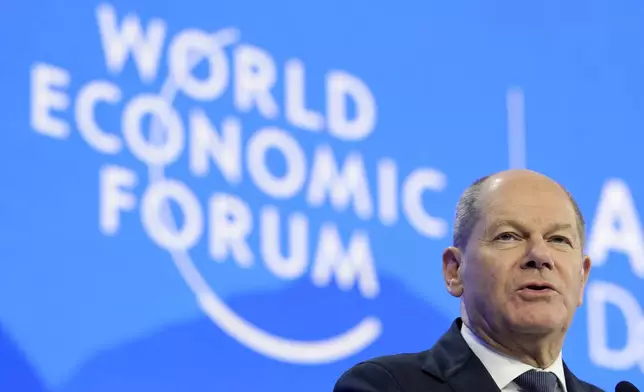 German Chancellor Olaf Scholz speaks at the Annual Meeting of World Economic Forum in Davos, Switzerland, Tuesday, Jan. 21, 2025. (AP Photo/Markus Schreiber)