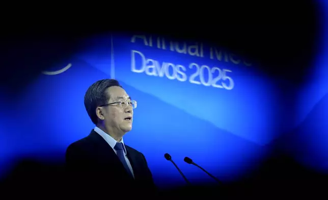 China's Vice Prime Minister Ding Xuexiang speaks at the Annual Meeting of World Economic Forum in Davos, Switzerland, Tuesday, Jan. 21, 2025. (AP Photo/Markus Schreiber)
