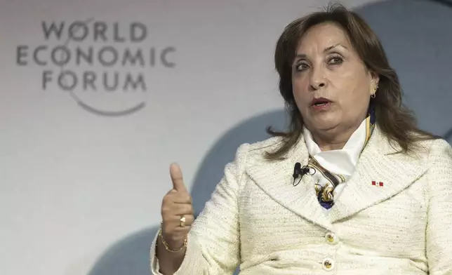 President of Peru Dina Ercilia Boluarte speaks during a panel session of the 55th annual meeting of the World Economic Forum (WEF), in Davos, Switzerland, Wednesday, Jan. 22, 2025. (Michael Buholzer/Keystone via AP)