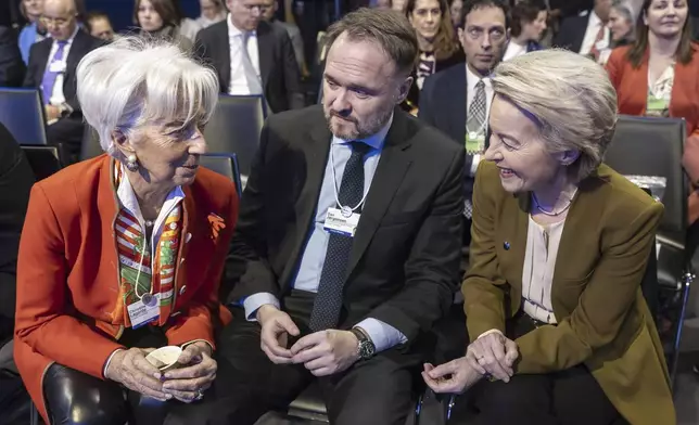 From left, President of the European Central Bank Christine Lagarde, European Commissioner for Energy and Housing Dan Jorgensen, and President of the European Commission Ursula von der Leyen speak as they attend the 55th annual meeting of the World Economic Forum (WEF), in Davos, Switzerland, Thursday, Jan. 23, 2025. (Michael Buholzer/Keystone via AP)
