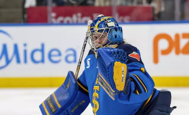 Toronto Sceptres goaltender Raygan Kirk (1) makes a save against the New York Sirens during the second period of a PWHL hockey game in Toronto, Saturday Jan. 25, 2025. (Frank Gunn/The Canadian Press via AP)