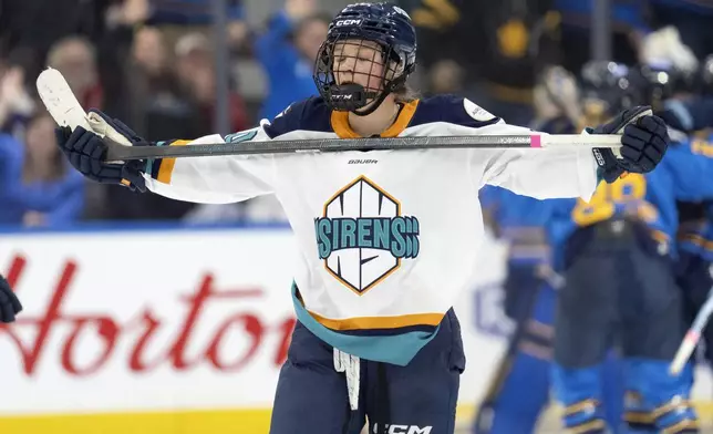 New York Sirens forward Sarah Fillier (10) reacts after the Toronto Sceptres scored an empty net goal during the third period of a PWHL hockey game in Toronto, Saturday Jan. 25, 2025. (Frank Gunn/The Canadian Press via AP)