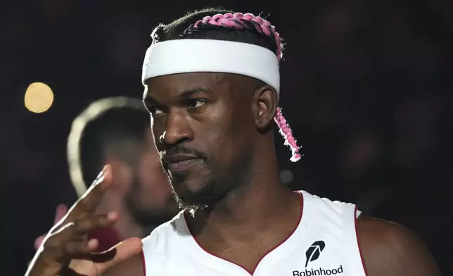 Miami Heat forward Jimmy Butler is introduced before an NBA basketball game against the New Orleans Pelicans Wednesday, Jan. 1, 2025, in Miami. (AP Photo/Lynne Sladky)