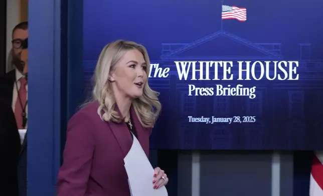 White House press secretary Karoline Leavitt walks out to speak with reporters in the James Brady Press Briefing Room at the White House, Tuesday, Jan. 28, 2025, in Washington. (AP Photo/Alex Brandon)