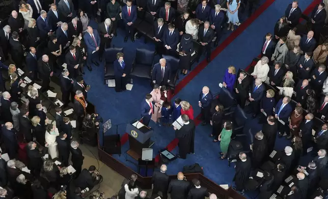 Vice President-elect JD Vance takes the oath of office during the 60th Presidential Inauguration in the Rotunda of the U.S. Capitol in Washington, Monday, Jan. 20, 2025. (Chip Somodevilla/Pool Photo via AP)