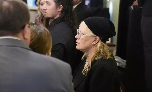 Amy Carter arrives for the funeral service for former President Jimmy Carter at Maranatha Baptist Church in Plains, Ga., Thursday, Jan. 9, 2025. Carter died Dec. 29 at the age of 100. (AP Photo/Alex Brandon, Pool)