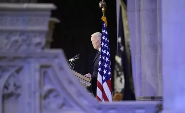 President Joe Biden speaks a tribute during a state funeral for former President Jimmy Carter, at Washington National Cathedral, Thursday, Jan. 9, 2025, in Washington. (AP Photo/Ben Curtis)