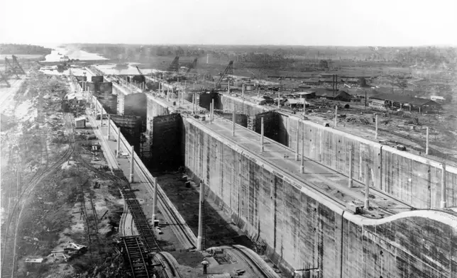 FILE - Looking north from the lighthouse on the west wall is the Gatun middle locks of the Panama Canal in the final stages of construction on June 25, 1913. Built by France and the United States, the canal links the Atlantic and the Pacific Oceans for commercial transportation. The lower locks and the Atlantic Ocean entrance can be seen in the distance. (AP Photo, File)