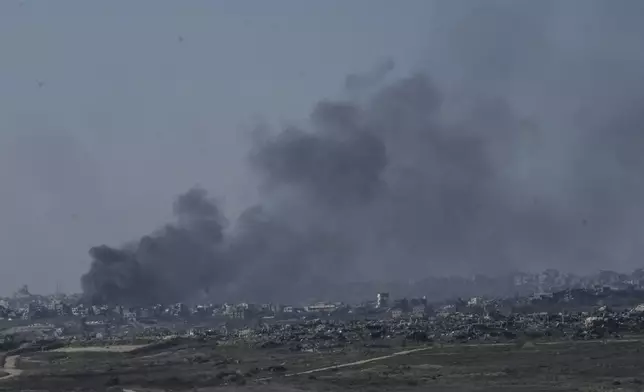 Smoke rises following an explosion in the Gaza Strip, as seen from southern Israel, Thursday, Jan. 9, 2025. (AP Photo/Mahmoud Illean)