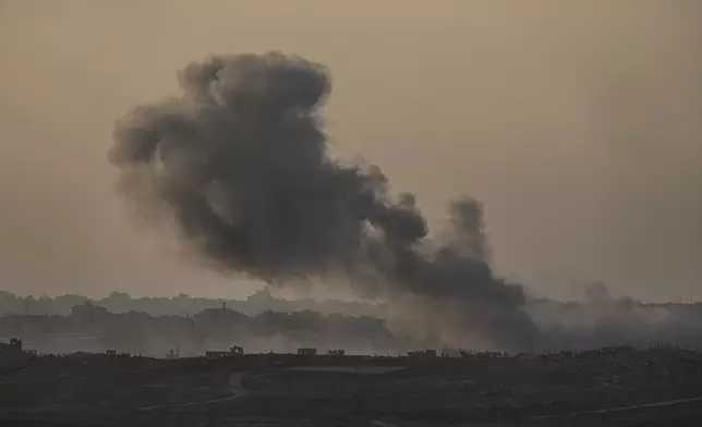 Smoke rises following an Israeli airstrike in the Gaza Strip, as seen from Sderot, southern Israel, Monday, Jan. 6, 2025. (AP Photo/Tsafrir Abayov)