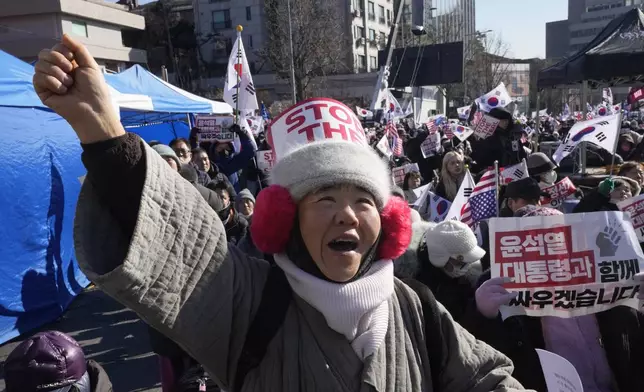 A supporter of impeached South Korean President Yoon Suk Yeol shouts slogans during a rally to oppose his impeachment near the presidential residence in Seoul, South Korea, Friday, Jan. 10, 2025. (AP Photo/Ahn Young-joon)