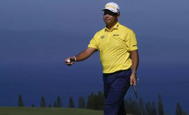 Hideki Matsuyama, of Japan, reacts after missing birdie on the fourth green during the final round of The Sentry golf event, Sunday, Jan. 5, 2025, at Kapalua Plantation Course in Kapalua, Hawaii. (AP Photo/Matt York)