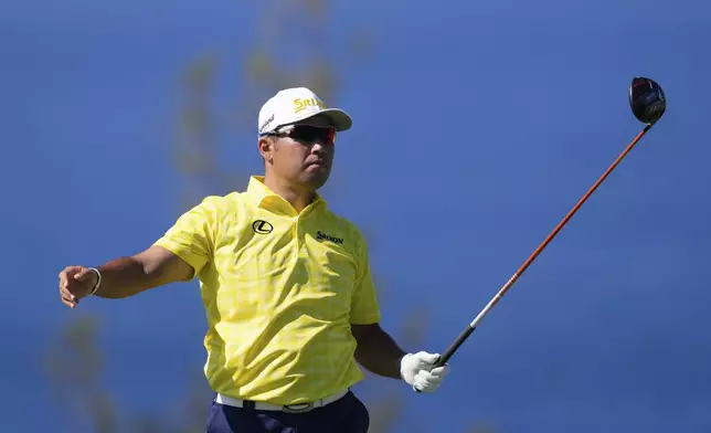 Hideki Matsuyama, of Japan, watches his tee shot on the 13th hole during the final round of The Sentry golf event, Sunday, Jan. 5, 2025, at Kapalua Plantation Course in Kapalua, Hawaii. (AP Photo/Matt York)