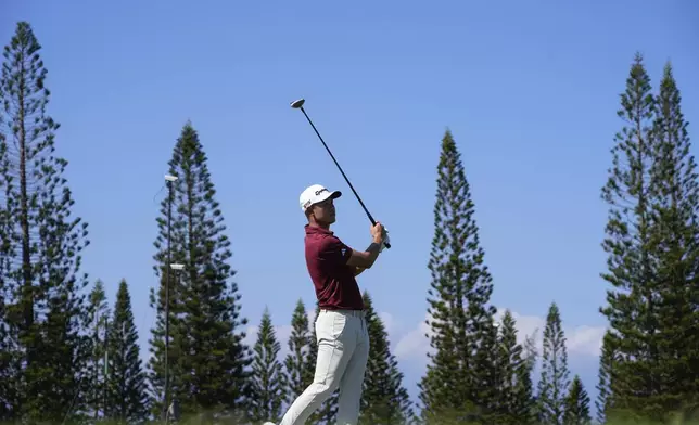 Collin Morikawa watches his shot on the ninth hole during the final round of The Sentry golf event, Sunday, Jan. 5, 2025, at Kapalua Plantation Course in Kapalua, Hawaii. (AP Photo/Matt York)