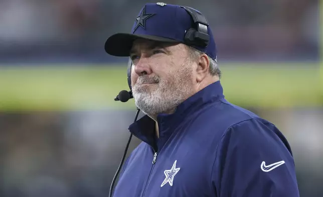 Dallas Cowboys head coach Mike McCarthy looks on during the second half of an NFL football game against the Washington Commanders, Sunday, Jan. 5, 2025, in Arlington, Texas. (AP Photo/Gareth Patterson)