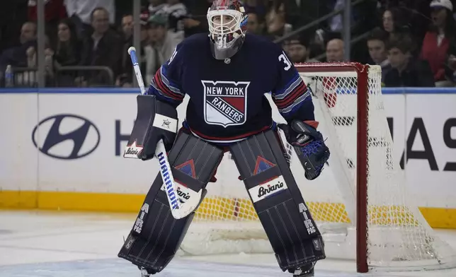 New York Rangers goaltender Igor Shesterkin (31) protects the net during the second period of an NHL hockey game against the New Jersey Devils, Thursday, Jan. 9, 2025, in New York. (AP Photo/Frank Franklin II)