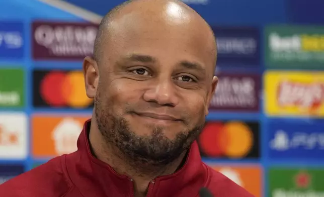 Bayern's head coach Vincent Kompany arrives for a news conference in Munich, Germany, Tuesday, Jan. 28, 2025, ahead of the Champions League opening phase soccer match between FC Bayern and Slovan Bratislava. (AP Photo/Matthias Schrader)