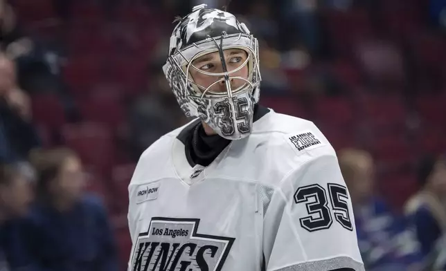 Los Angeles Kings goaltender Darcy Kuemper (35) waits for a face off against the Vancouver Canucks during the third period of an NHL hockey game in Vancouver, British Columbia, Thursday, Jan. 16, 2025. (Ethan Cairns/The Canadian Press via AP)