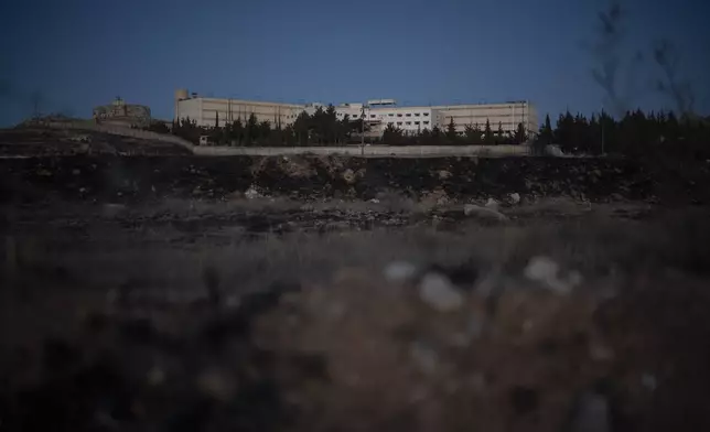 FILE - The infamous Saydnaya military prison is seen during dusk, on the outskirts of Damascus, Syria, on Dec. 19, 2024. (AP Photo/Leo Correa, File)