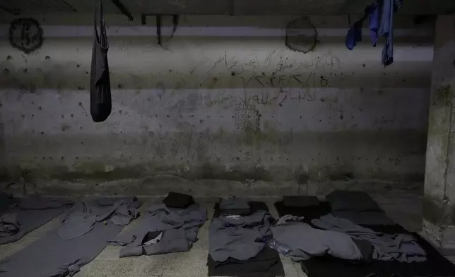 Blankets used by prisoners as mattresses are seen at Branch 215, a detention facility run by military intelligence during Bashar Assad's regime in Damascus, Syria, on Dec. 17, 2024. (AP Photo/Hussein Malla)