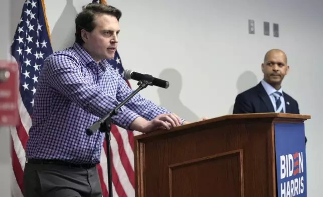 FILE - Former Capitol Police Sergeant Aquilino Gonell, right, listens as Metropolitan Police Officer Daniel Hodges speaks during a news conference in Washington, April 1, 2024. (AP Photo/Susan Walsh, File)