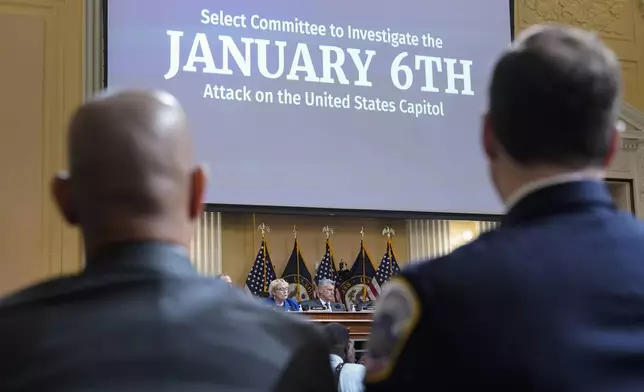 FILE - U.S. Capitol Police Sgt. Aquilino Gonell, left, and Washington Metropolitan Police Department officer Daniel Hodges listen as the House select committee investigating the Jan. 6 attack on the U.S. Capitol holds a hearing on Capitol Hill in Washington, Oct. 13, 2022. (AP Photo/Jacquelyn Martin, File)