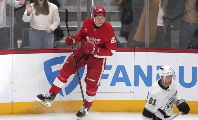 Detroit Red Wings left wing Elmer Soderblom (85) celebrates his goal against the Los Angeles Kings in the second period of an NHL hockey game Monday, Jan. 27, 2025, in Detroit. (AP Photo/Paul Sancya)