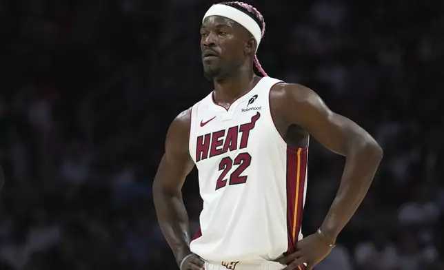 Miami Heat forward Jimmy Butler (22) stands on the court during the second half of an NBA basketball game against the New Orleans Pelicans, Wednesday, Jan. 1, 2025, in Miami. (AP Photo/Lynne Sladky)