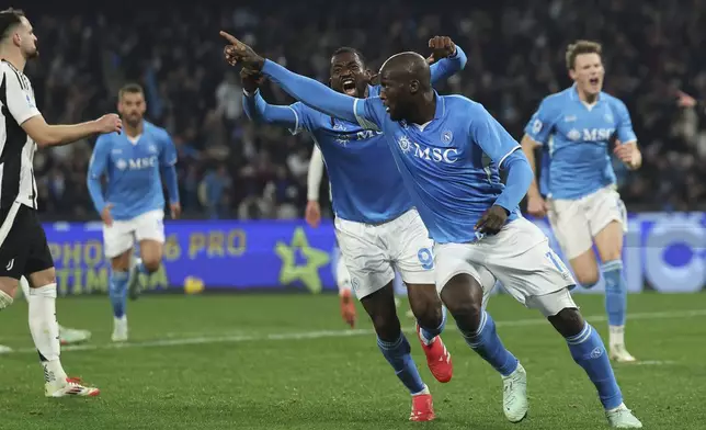 Napoli's Romelu Lukaku, front right, celebrates after scoring during the Serie A soccer match between Napoli and Juventus at the Diego Armando Maradona Stadium in Naples, Italy, Saturday Jan. 25, 2025. (Alessandro Garofalo/LaPresse via AP)