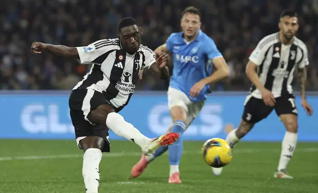 Juventus' Randal Kolo Muani scores the team's first goal during the Serie A soccer match between Napoli and Juventus at the Diego Armando Maradona Stadium in Naples, Italy, Saturday Jan. 25, 2025. (Alessandro Garofalo/LaPresse via AP)