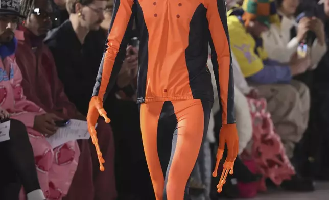 A model wears a creation as part of the men's Walter van Beirendonck Fall-Winter 2025-2026 collection, that was presented in Paris, Wednesday, Jan. 22, 2025. (AP Photo/Thomas Padilla).