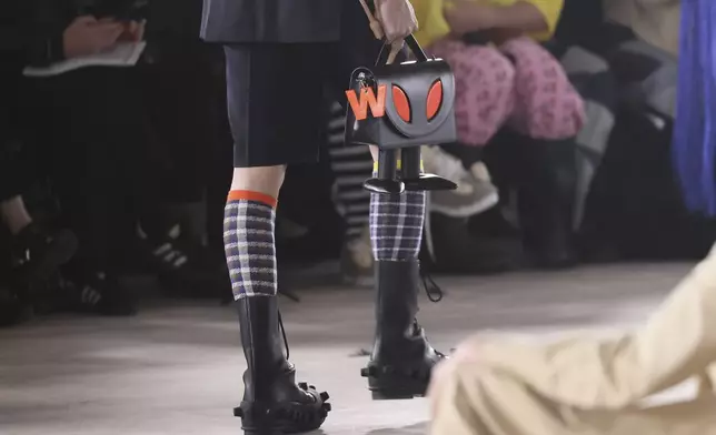 A model wears a creation as part of the men's Walter van Beirendonck Fall-Winter 2025-2026 collection, that was presented in Paris, Wednesday, Jan. 22, 2025. (AP Photo/Thomas Padilla).