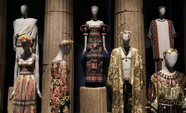 Creations are displayed during the exhibition "From the Heart to the Hands: Dolce&amp;Gabbana" at the Grand Palais, in Paris, Thursday, Jan. 9, 2025. (AP Photo/Thibault Camus)