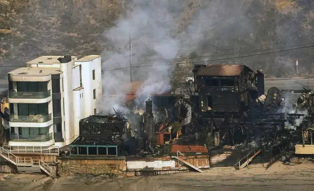 Beachfront properties are left destroyed by the Palisades Fire, Thursday, Jan. 9, 2025 in Malibu, Calif. (AP Photo/Mark J. Terrill)