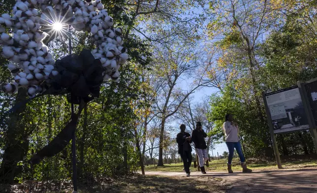 A memorial wreath of cotton bolls is seen at the entrance to the Jimmy Carter Boyhood Farm, Wednesday, Jan. 1, 2025, in Archery, Ga. (AP Photo/Alex Brandon, Pool)