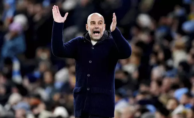 Manchester City manager Pep Guardiola reacts during the Champions League opening phase soccer match between Manchester City and Club Brugge at the Etihad Stadium in Manchester, Wednesday, Jan. 29, 2025. (Mike Egerton/PA via AP)
