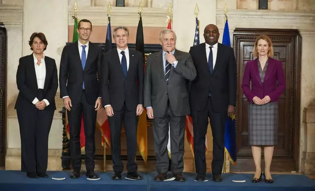 From left, Anne Grillo, Director of the Middle East and North Africa Department at the French Ministry of Foreign Affairs, Günter Sautter, German Political Director of the Ministry of Foreign Affairs, United States Secretary of State Antony Blinken, Italian Foreign Minister Antonio Tajani, Britain's Foreign Secretary David Lammy, and EU High Representative for Foreign Affairs and Security Policy Kaja Kallas, pose for a family photo during a meeting, Thursday, Jan. 9, 2025, at Rome's Villa Madama, on the situation in Syria after the collapse of the Assad regime. (AP Photo/Andrew Medichini