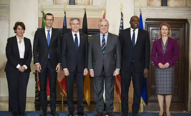 From left, Anne Grillo, Director of the Middle East and North Africa Department at the French Ministry of Foreign Affairs, Günter Sautter, German Political Director of the Ministry of Foreign Affairs, United States Secretary of State Antony Blinken, Italian Foreign Minister Antonio Tajani, Britain's Foreign Secretary David Lammy, and EU High Representative for Foreign Affairs and Security Policy Kaja Kallas, pose for a family photo during a meeting, Thursday, Jan. 9, 2025, at Rome's Villa Madama, on the situation in Syria after the collapse of the Assad regime. (AP Photo/Andrew Medichini