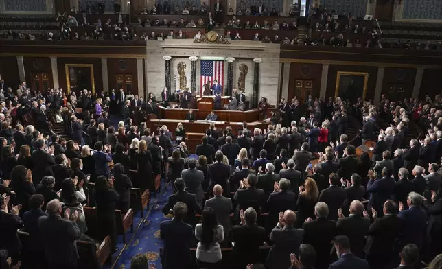 Vice President Kamala Harris shakes hands with House Speaker Mike Johnson of La., after a joint session of Congress confirmed the Electoral College votes, affirming President-elect Donald Trump's victory in the presidential election, Monday, Jan. 6, 2025, at the U.S. Capitol in Washington. (AP Photo/Matt Rourke)