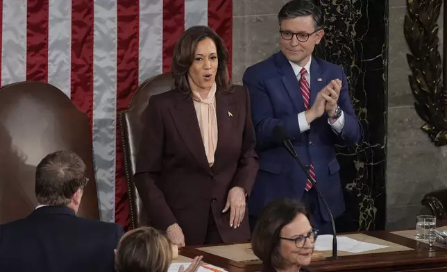 Vice President Kamala Harris, left, adjourns as House Speaker Mike Johnson of La., looks on as a joint session of Congress convenes to confirm the Electoral College votes, affirming President-elect Donald Trump's victory in the presidential election, Monday, Jan. 6, 2025, at the U.S. Capitol in Washington. (AP Photo/Manuel Balce Ceneta)