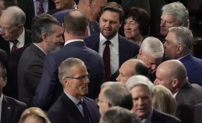 Republicans congratulate Vice President-elect JD Vance after a joint session of Congress convened to confirm the Electoral College votes, affirming President-elect Donald Trump's victory in the presidential election, Monday, Jan. 6, 2025, at the U.S. Capitol in Washington. (AP Photo/Manuel Balce Ceneta)