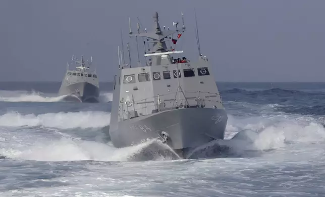 Two Kuang Hua VI-class missile boats are seen during a simulated attack drill off Kaohsiung City, southern Taiwan, Thursday, Jan. 9, 2025. (AP Photo/Chiang Ying-ying)