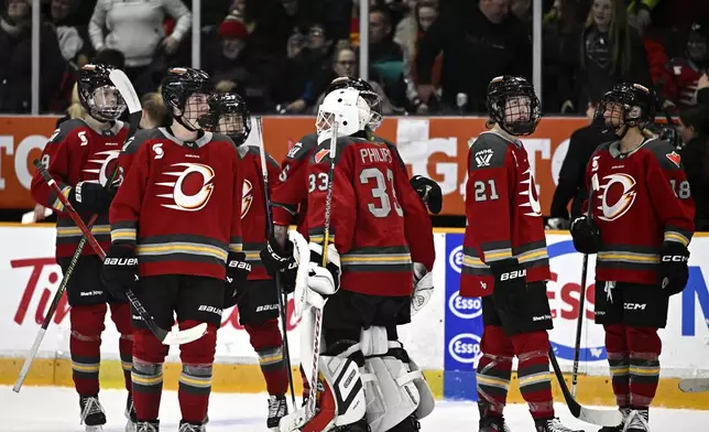 Ottawa Charge goaltender Gwyneth Philips (33) skates toward teammates after an overtime loss to the Boston Fleet in PWHL hockey game action in Ottawa, Ontario, Saturday, Jan. 11, 2025. (Justin Tang/The Canadian Press via AP)