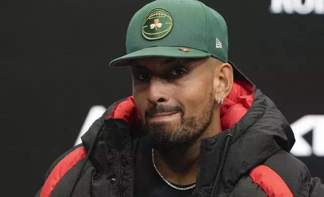 Australia's Nick Kyrgios answers questions at a press conference ahead of the Australian Open tennis championship in Melbourne, Australia, Friday, Jan. 10, 2025. (AP Photo/Ng Han Guan)