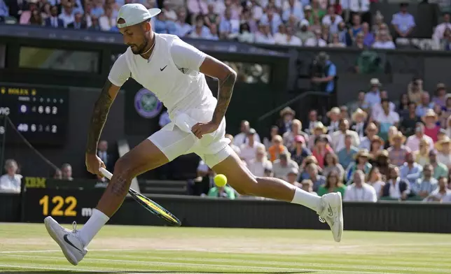 FILE - Australia's Nick Kyrgios returns the ball from between his legs to Serbia's Novak Djokovic in the final of the men's singles on day fourteen of the Wimbledon tennis championships in London, Sunday, July 10, 2022. (AP Photo/Alastair Grant, File)