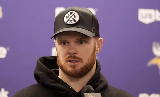 Minnesota Vikings quarterback Sam Darnold talks to the media following an NFL football game against the Detroit Lions, Sunday, Jan. 5, 2025, in Detroit. (AP Photo/Charlie Riedel)