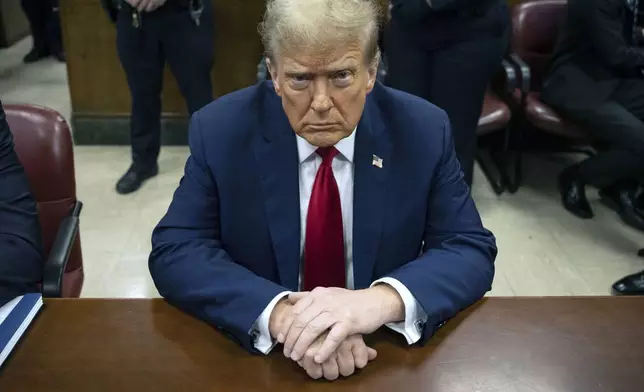 FILE - Former President Donald Trump waits for the start of proceedings in Manhattan criminal court, April 23, 2024, in New York. (AP Photo/Yuki Iwamura, Pool, File)