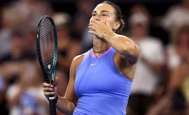 Belarus' Aryna Sabalenka celebrates winning against Russia's Polina Kudermetova during their final match at the Brisbane International in Brisbane, Australia, Sunday, Jan. 5, 2025. (AP Photo/Pat Hoelscher)