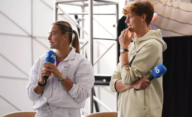 Defending champions Aryna Sabalenka and Jannik Sinner attend the official draw ceremony ahead of the Australian Open tennis championship in Melbourne, Australia, Thursday, Jan. 9, 2025. (AP Photo/Vincent Thian)